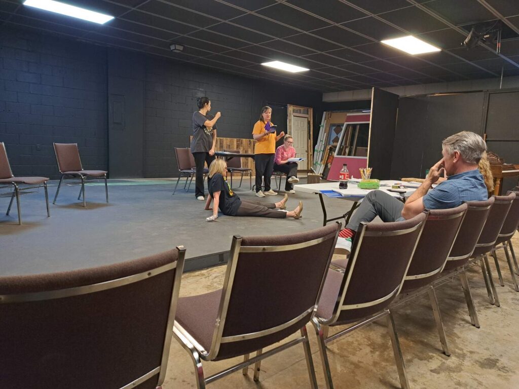 Actors rehearsing a scene from Rodgers + Hammerstein’s Cinderella at Tupelo Community Theatre's TOB location